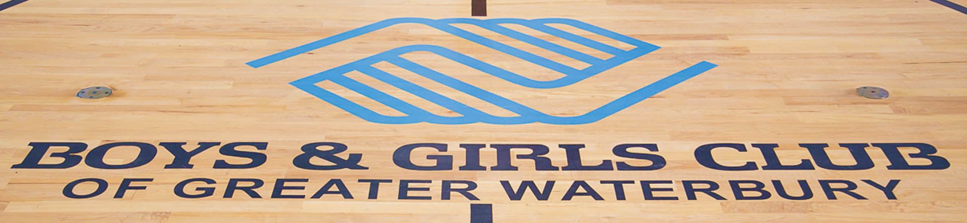 Image of BGCGW logo on basketball court